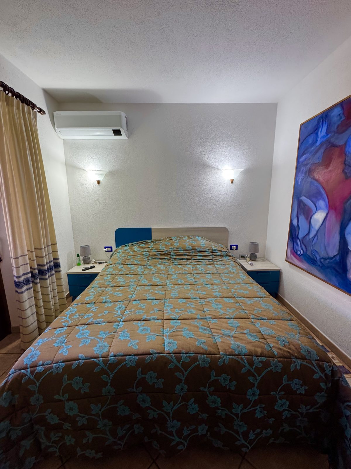 Double bedroom with air conditioning at Oasi del Mare — vacation rental in San Teodoro, Sardinia